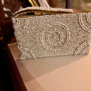 Tommy Bahama Cream Clutch with Elegant Design